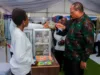 PROF. KABUDI AHAMASISHA WANANCHI KUTEMBELEA BANDA LA OFISI YA WAZIRI MKUU SABASABA